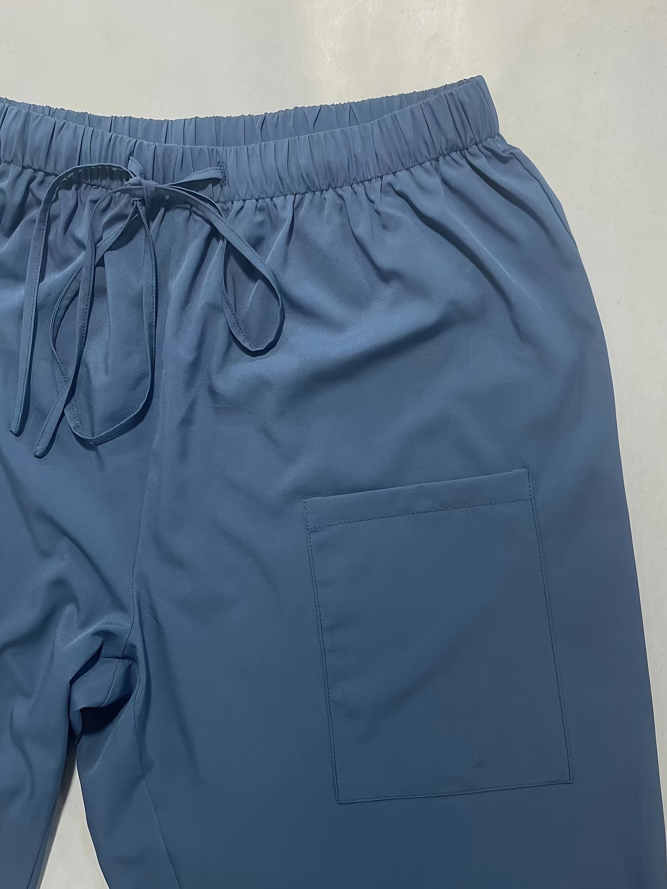 Weite blaue Hose mit Taschen und Kordelzug - Mia